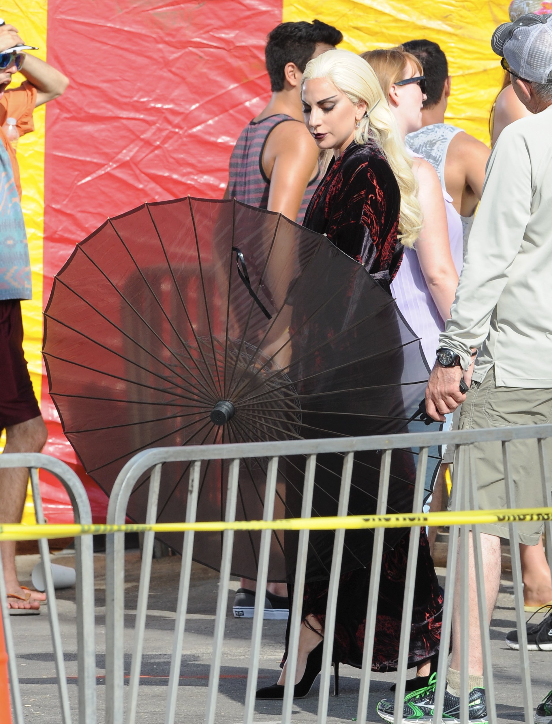 Countness Lady Gaga dress in all black for a beach carnival scene in Santa Monica for "American Horror Story Hotel" with co star Wes Bentley. The singer walk around the sand with black heels in a scorching hot day but had help with umbrellas and water fan for the crew.

Featuring: Lady Gaga
Where: Santa Monica, California, United States
When: 10 Sep 2015
Credit: Cousart/JFXimages/WENN.com
Countness Lady Gaga dress in all black for a beach carnival scene in Santa Monica for "American Horror Story Hotel" with co star Wes Bentley. The singer walk around the sand with black heels in a scorching hot day but had help with umbrellas and water fan for the crew.

Featuring: Lady Gaga
Where: Santa Monica, California, United States
When: 10 Sep 2015
Credit: Cousart/JFXimages/WENN.com