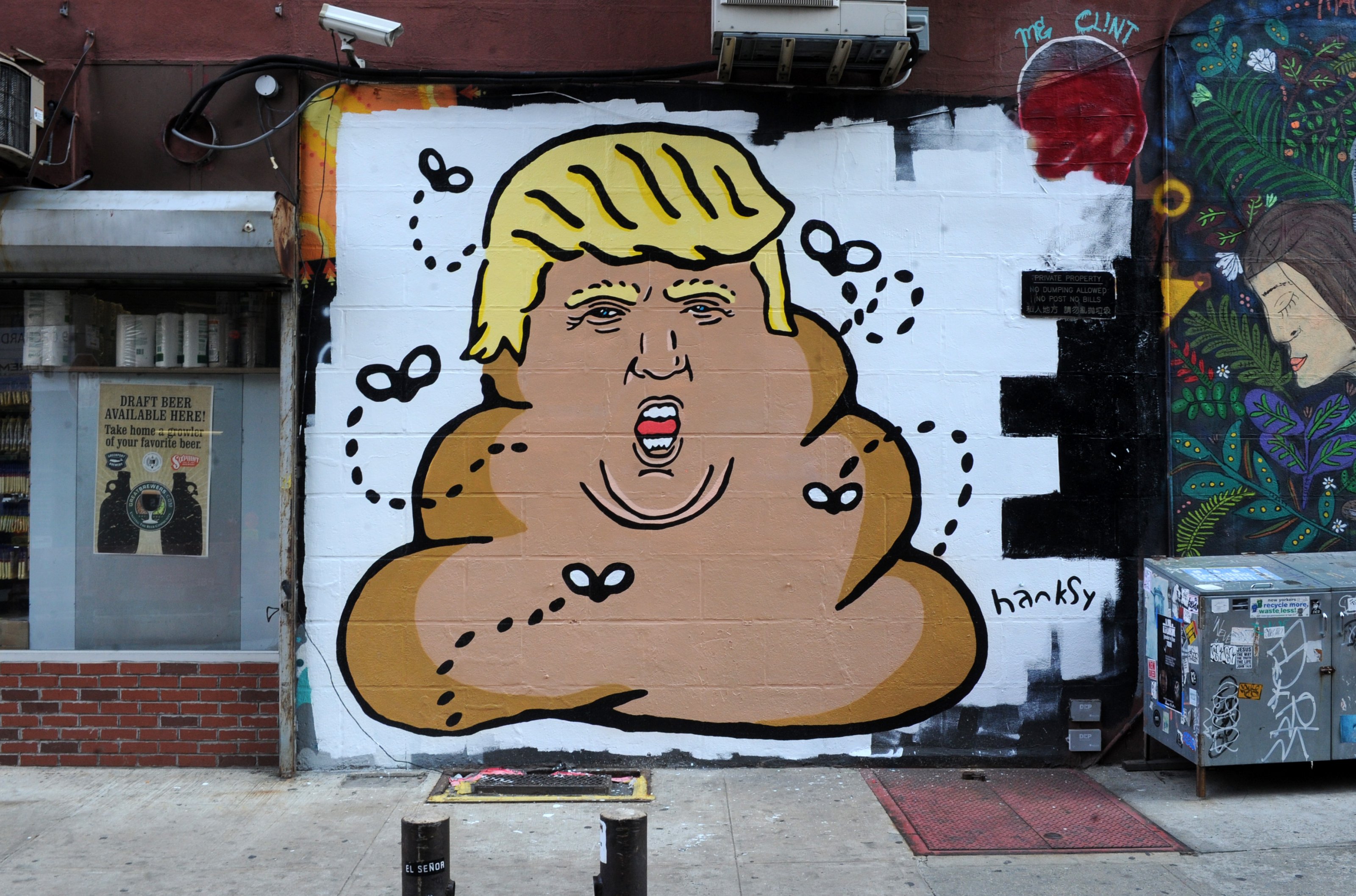A new Lower East Side mural by the anonymous painter and pun lover depicts the Republican presidential hopeful Donald Trump as a pile of poop crowned with lemon-yellow hair and circled by flies. New York City, NY, USA, September 3, 2015. Photo by Dennis Van Tine/ABACAPRESS.COM
